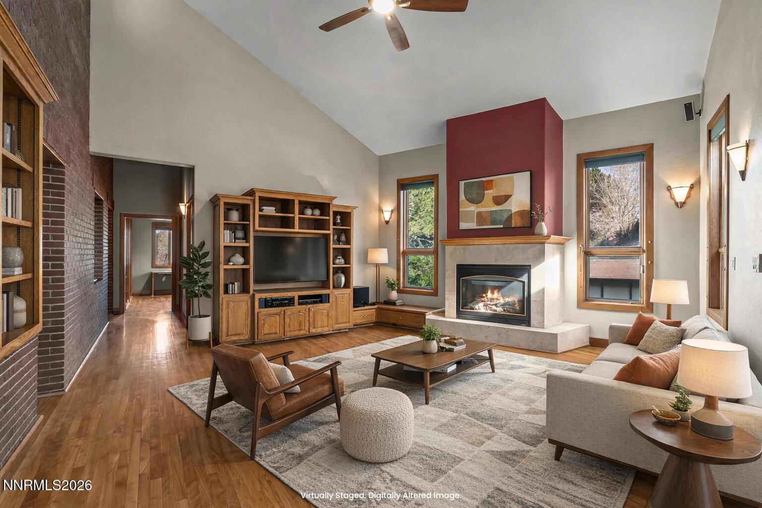 2425 Foley Way Reno, NV 89509 - Photo 15 of 73 a living room with furniture and a fireplace