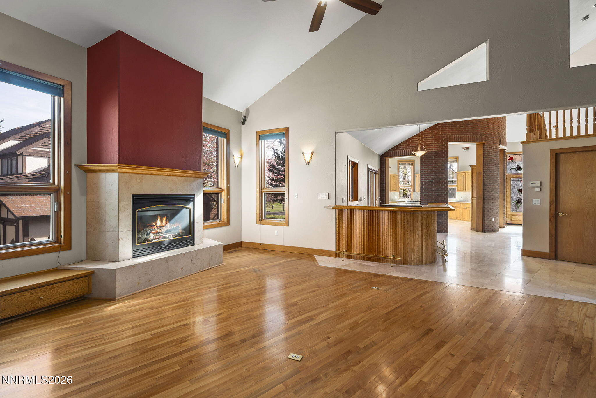 2425 Foley Way Reno, NV 89509 - Photo 16 of 73 a view of a livingroom with wooden floor and a fireplace