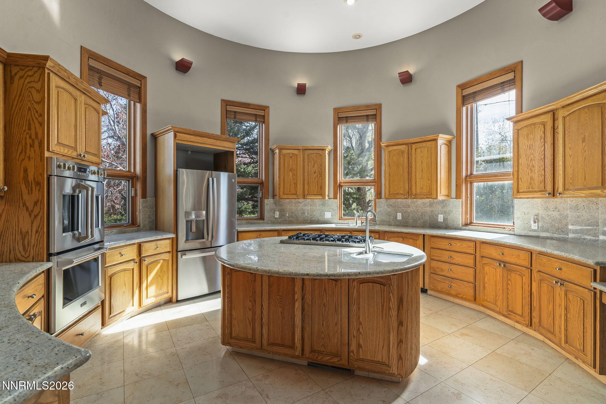 2425 Foley Way Reno, NV 89509 - Photo 19 of 73 a spacious bathroom with stainless steel appliances granite countertop a sink and a large mirror