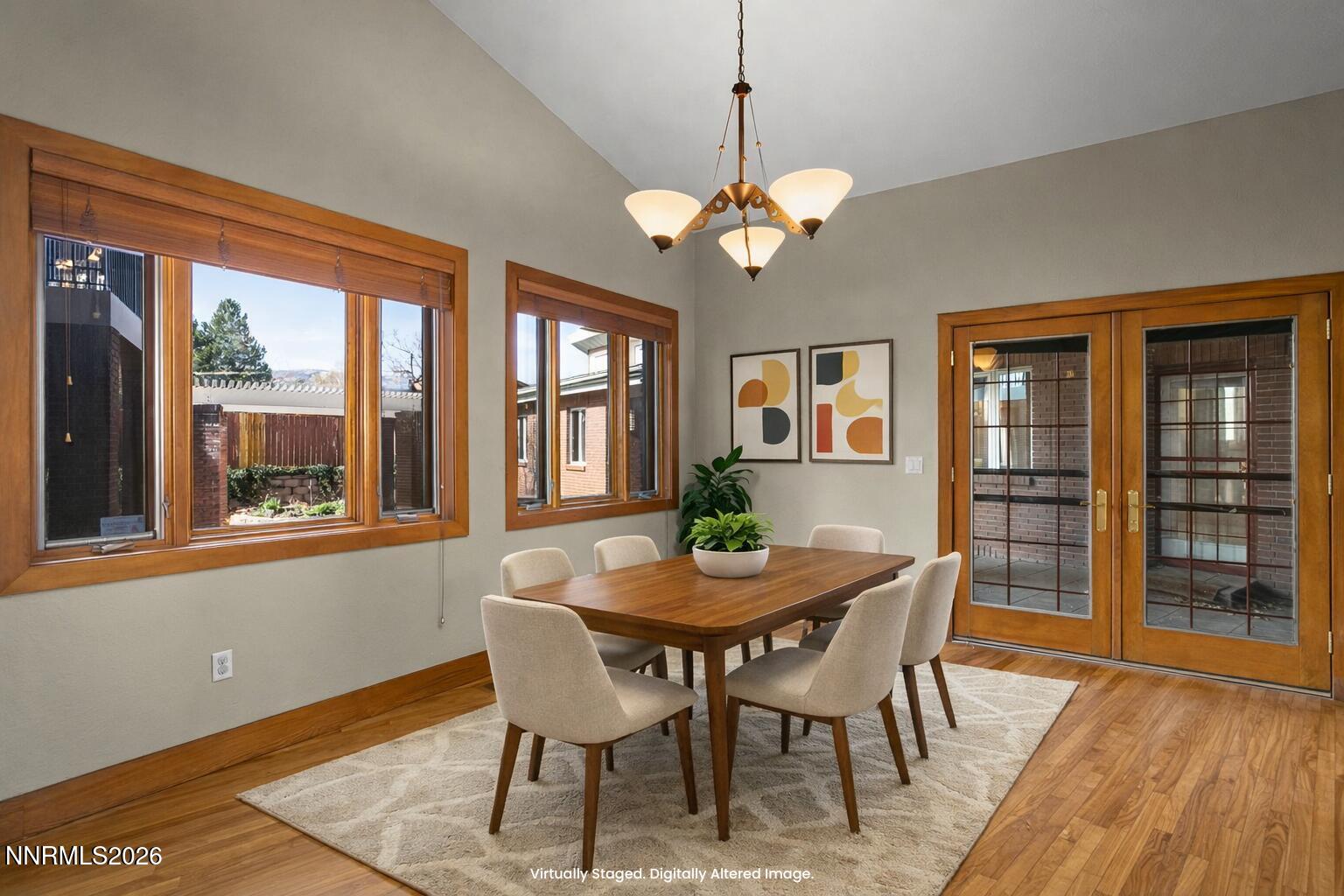 2425 Foley Way Reno, NV 89509 - Photo 26 of 73 a view of a dining room with furniture window and wooden floor