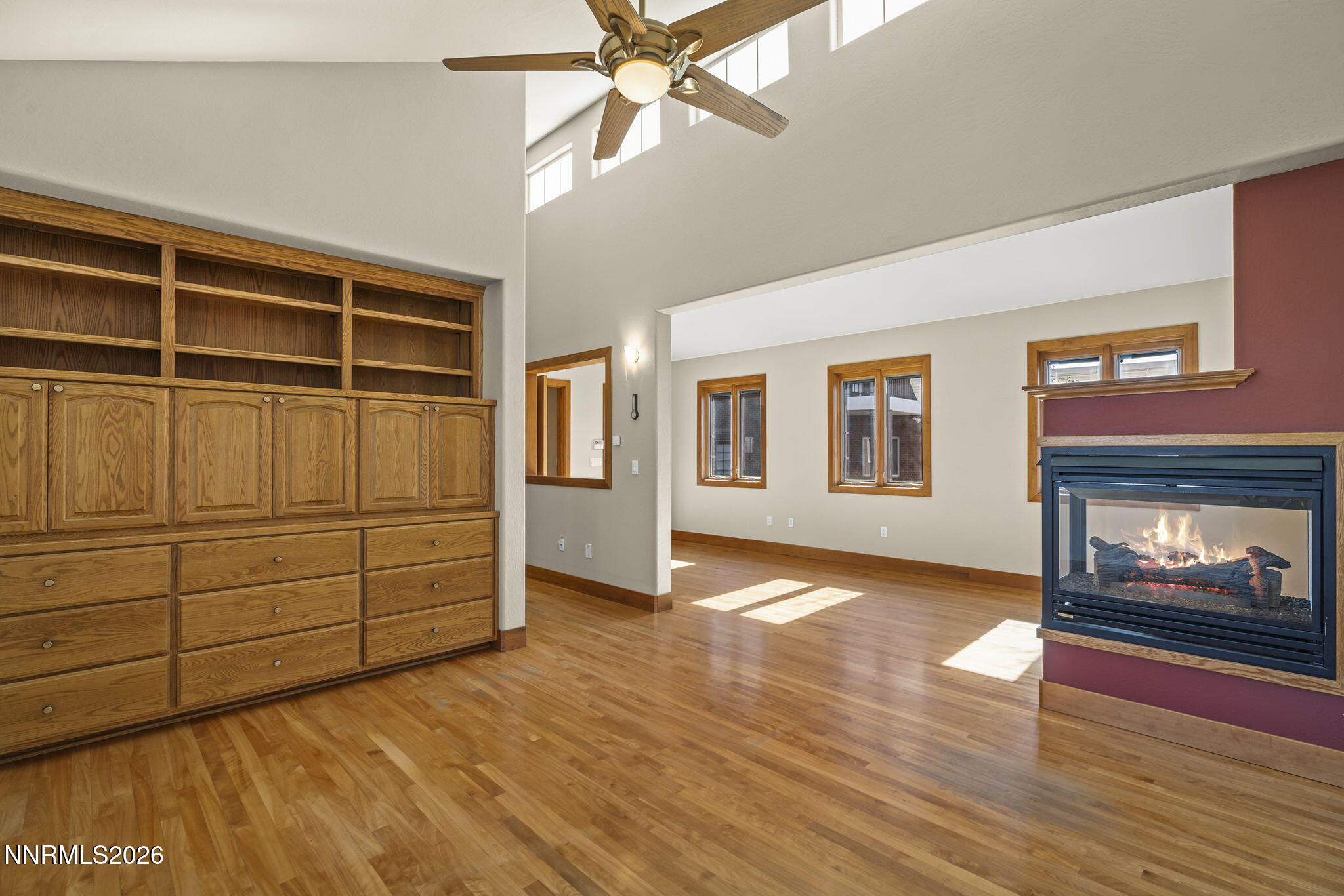 2425 Foley Way Reno, NV 89509 - Photo 30 of 73 wooden floor in an empty room with a fireplace