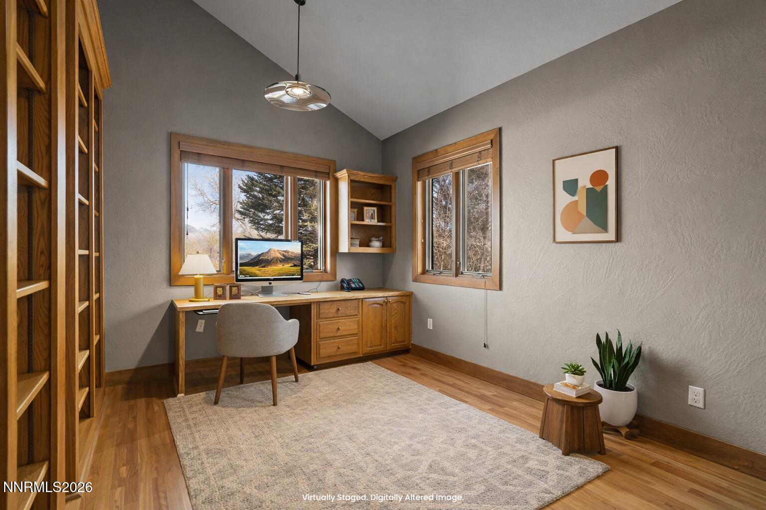 2425 Foley Way Reno, NV 89509 - Photo 37 of 73 a living room with furniture and windows