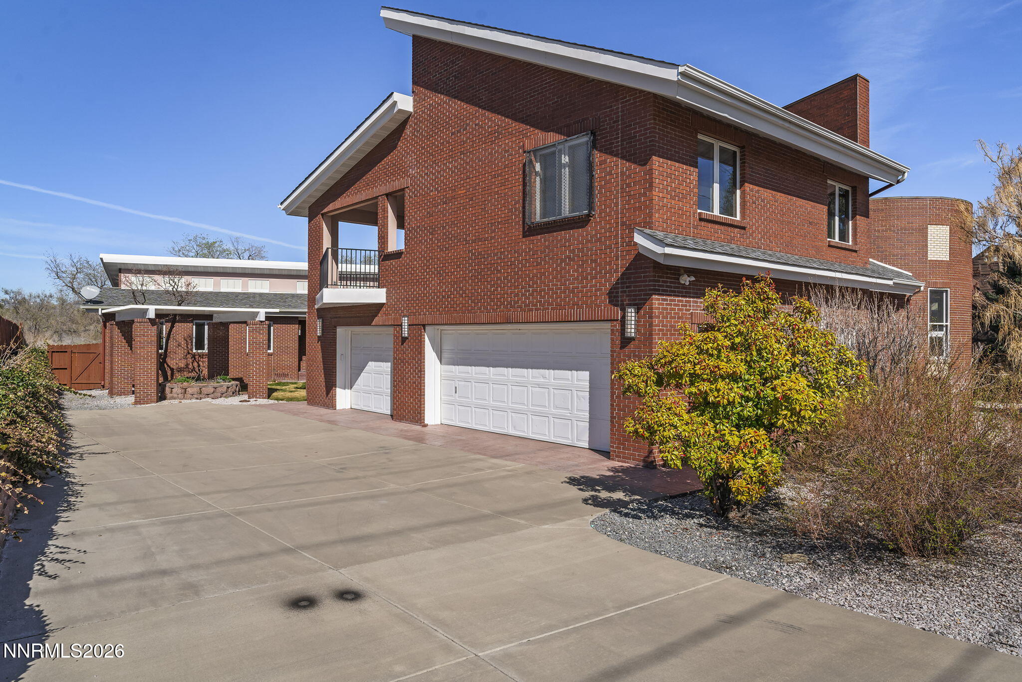 2425 Foley Way Reno, NV 89509 - Photo 4 of 73 a front view of a house with garden