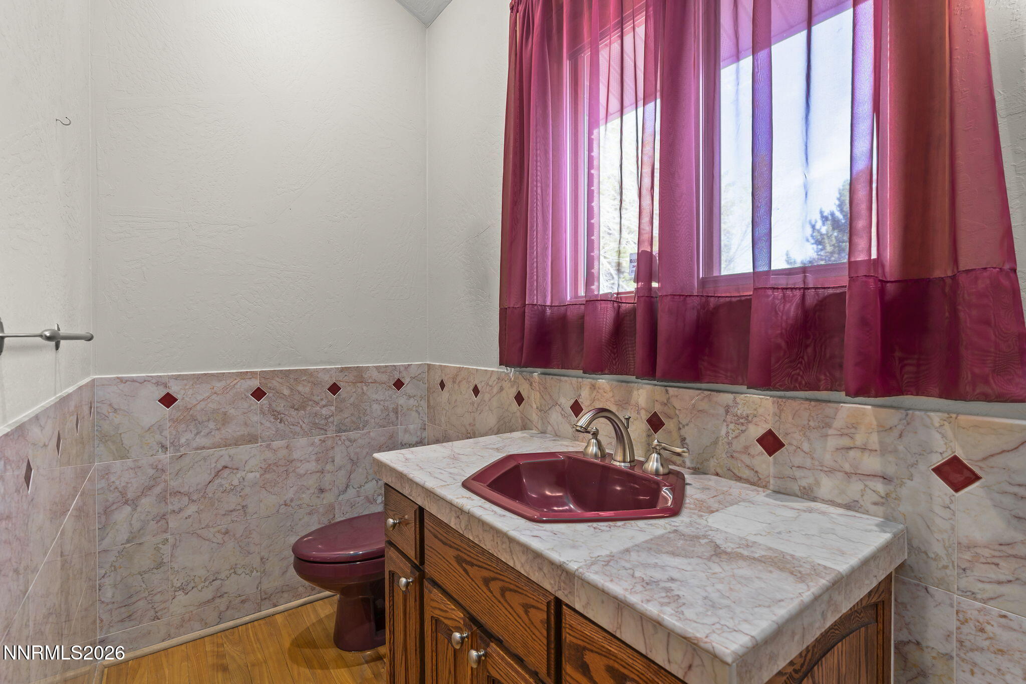 2425 Foley Way Reno, NV 89509 - Photo 43 of 73 a bathroom with a sink and a toilet