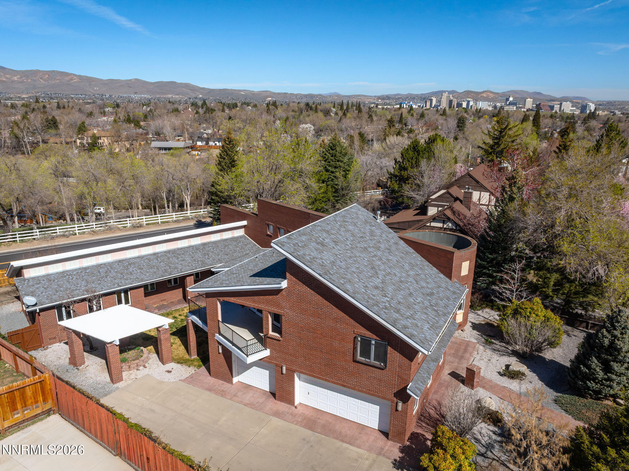 2425 Foley Way Reno, NV 89509 - Photo 5 of 73 an aerial view of a house with a mountain view