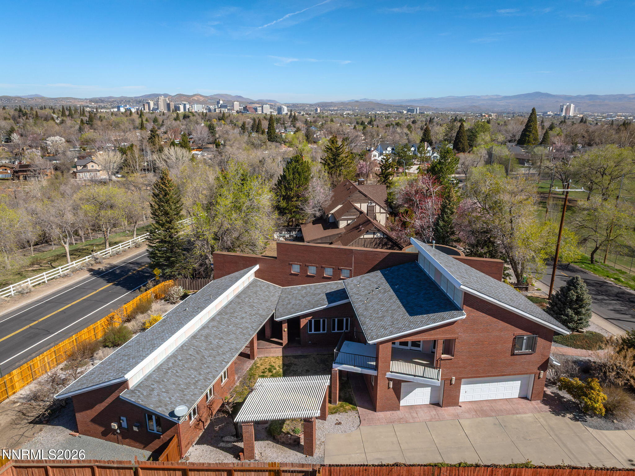 2425 Foley Way Reno, NV 89509 - Photo 6 of 73 an aerial view of a house with a swimming pool