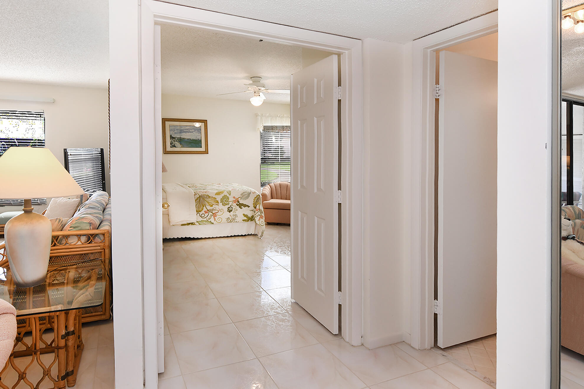 8541 Boca Glades Boulevard West, Unit A Boca Raton, FL 33434 - Photo 19 of 41 a view of a bathroom with tub and mirror