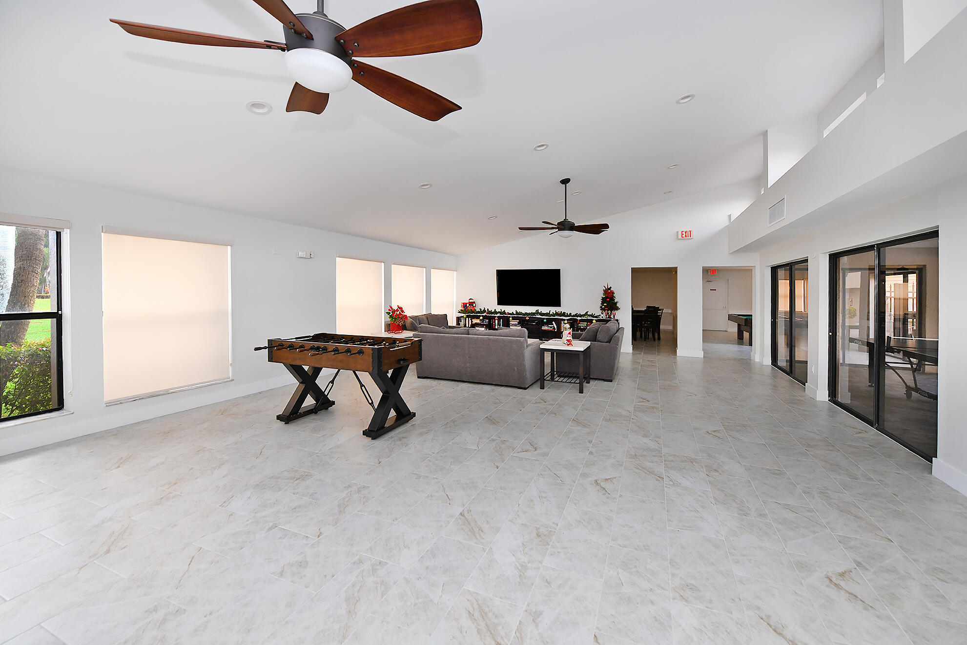 8541 Boca Glades Boulevard West, Unit A Boca Raton, FL 33434 - Photo 28 of 41 a room with furniture and a ceiling fan