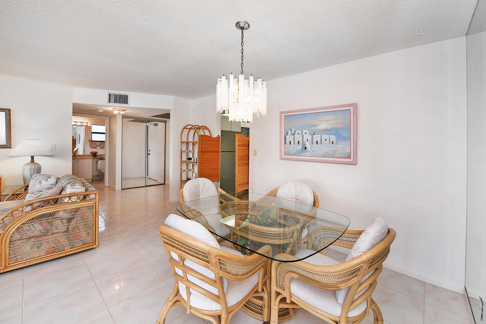 8541 Boca Glades Boulevard West, Unit A Boca Raton, FL 33434 - Photo 9 of 41 a dining room with furniture and window