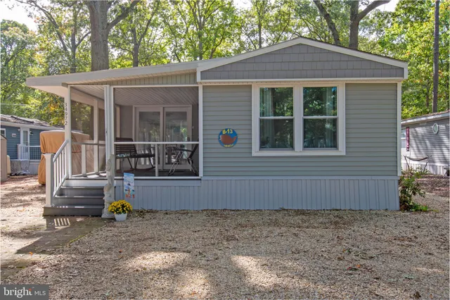 a house view with a backyard space