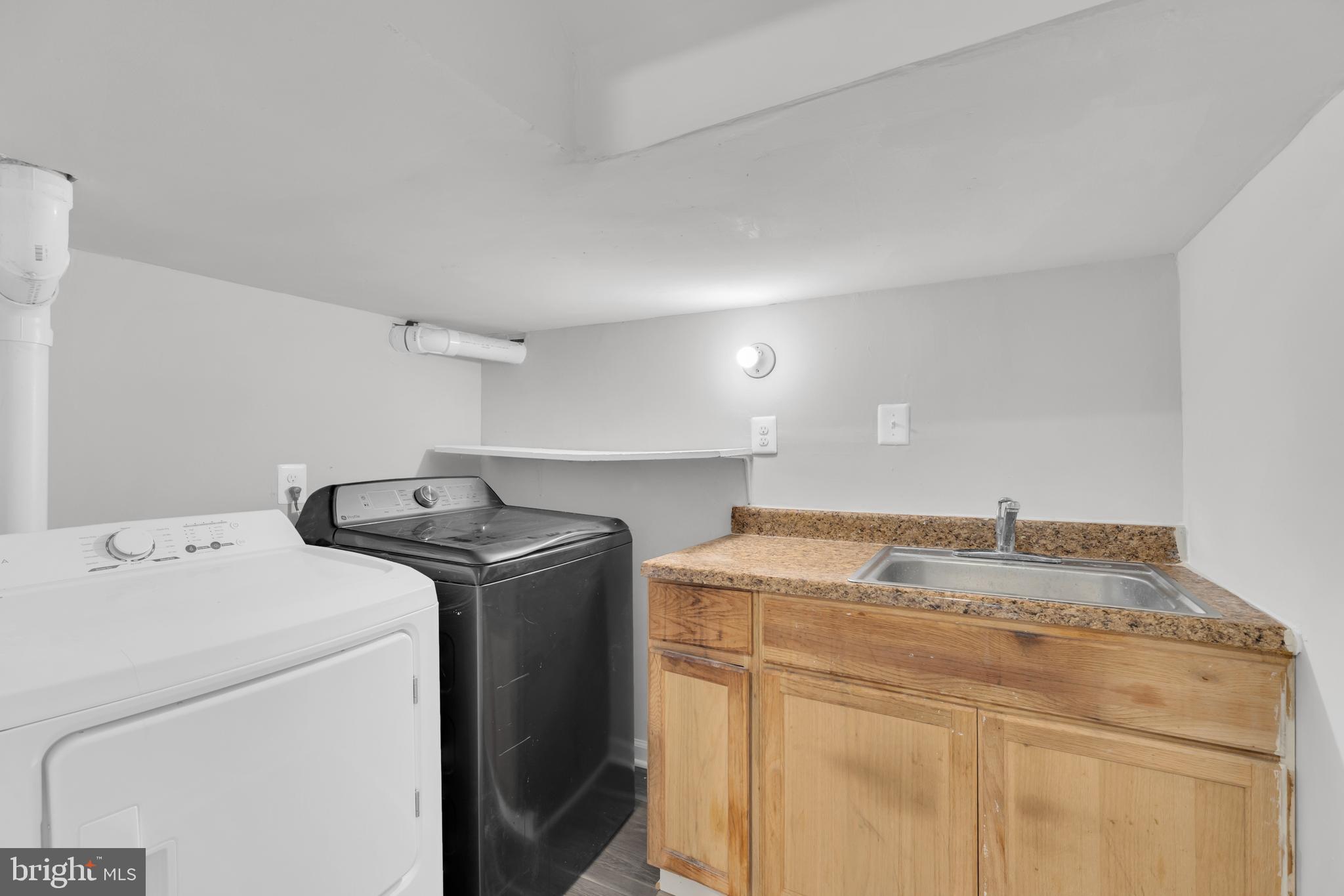 7635 Monitor Court Manassas, VA 20109 - Photo 31 of 46 a utility room with dryer and washer