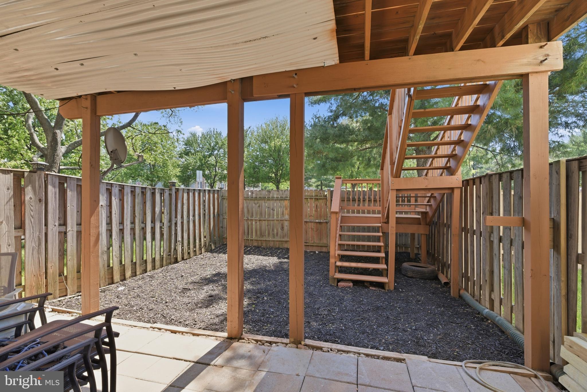 7635 Monitor Court Manassas, VA 20109 - Photo 37 of 46 a view of a porch with a floor to ceiling window and wooden fence
