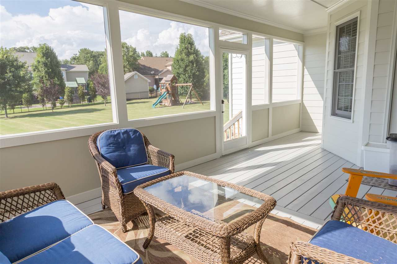 1108 Southern Escape Way Raleigh, NC 27603 - Photo 22 of 25 Screened porch overlooks huge backyard