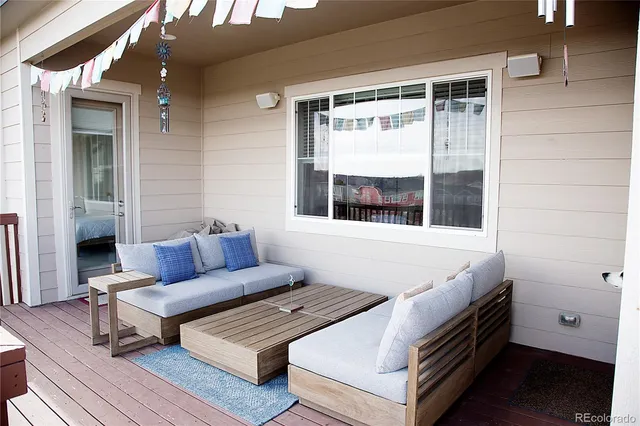a outdoor living space with furniture and a window
