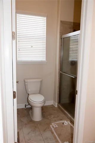 a bathroom with a toilet
