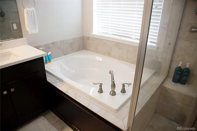 a bathroom with a sink and a bathtub