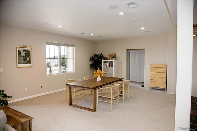 a room with furniture and window