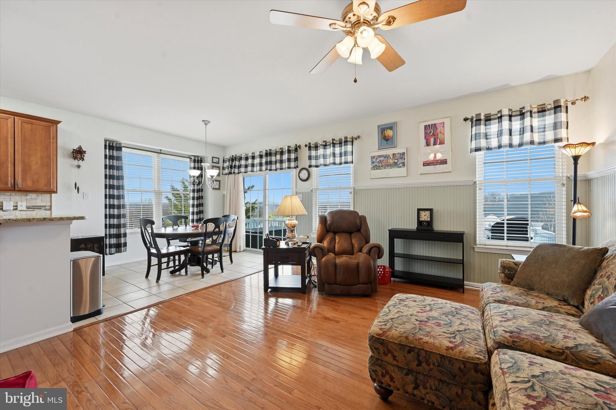249 Stoyer Road Coatesville, PA 19320 - Photo 12 of 25 a living room with furniture kitchen view and a large window