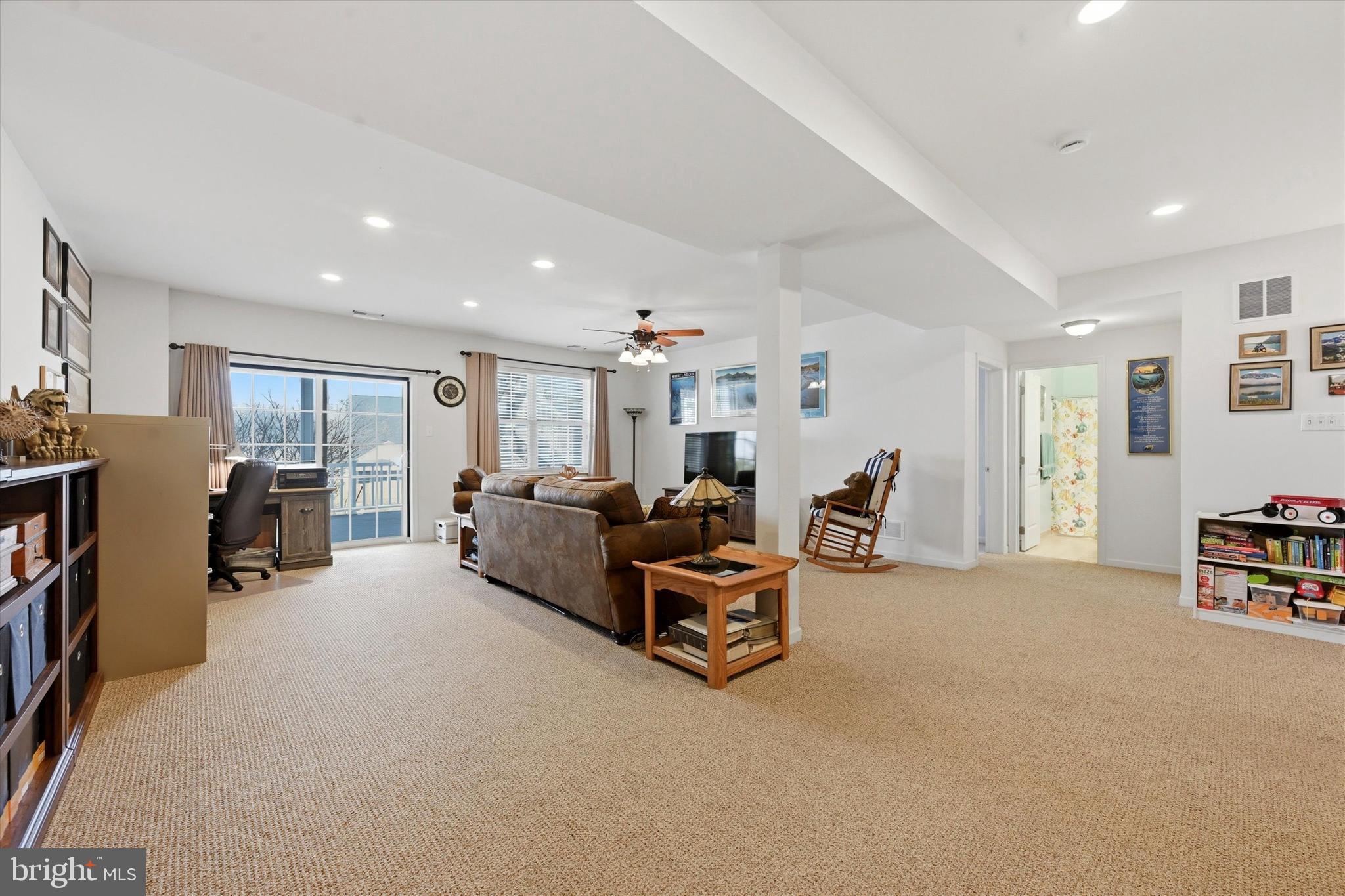 249 Stoyer Road Coatesville, PA 19320 - Photo 20 of 25 a living room with furniture cabinets and a flat screen tv
