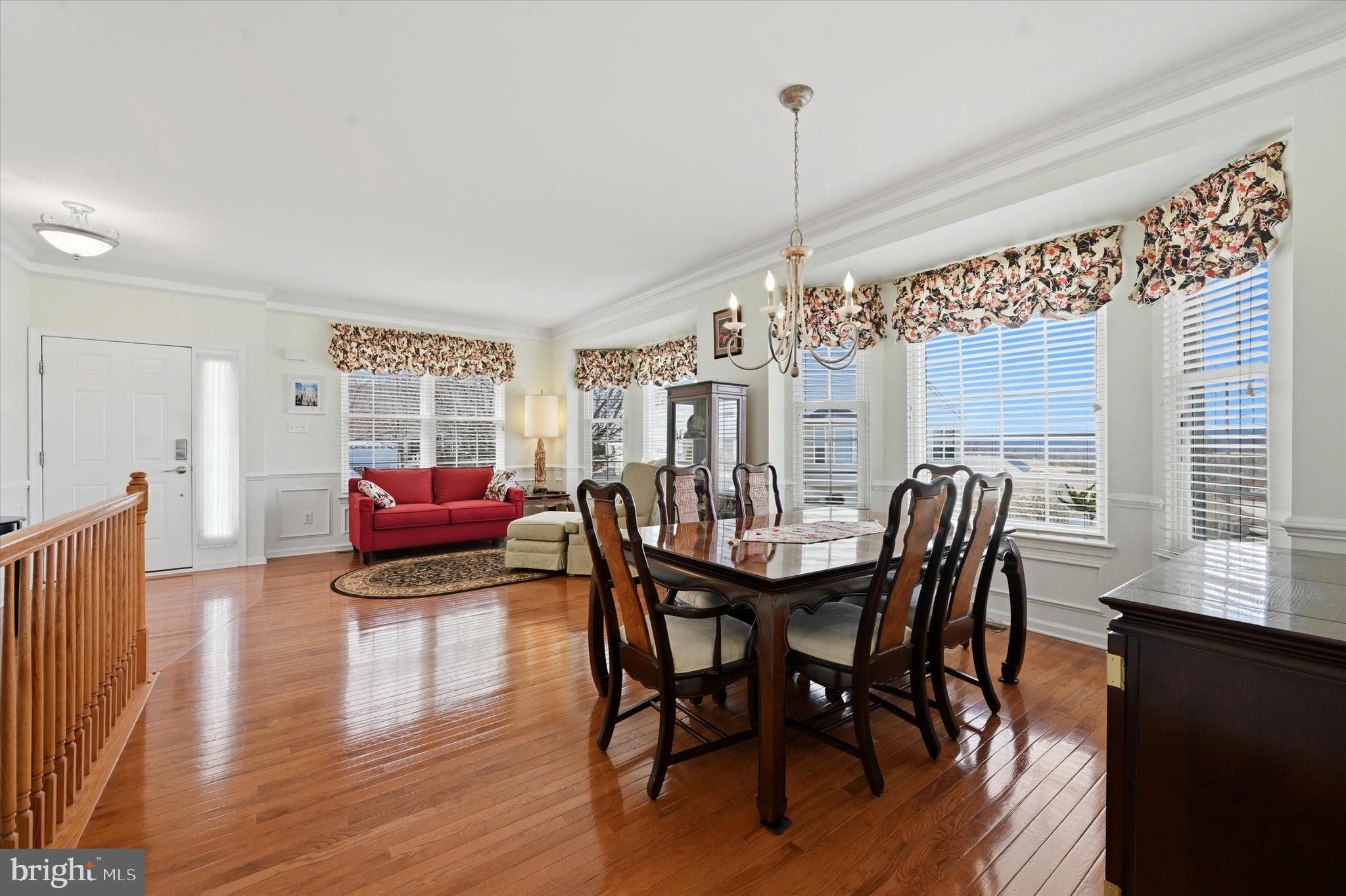 249 Stoyer Road Coatesville, PA 19320 - Photo 5 of 25 a living room with furniture a window and a chandelier