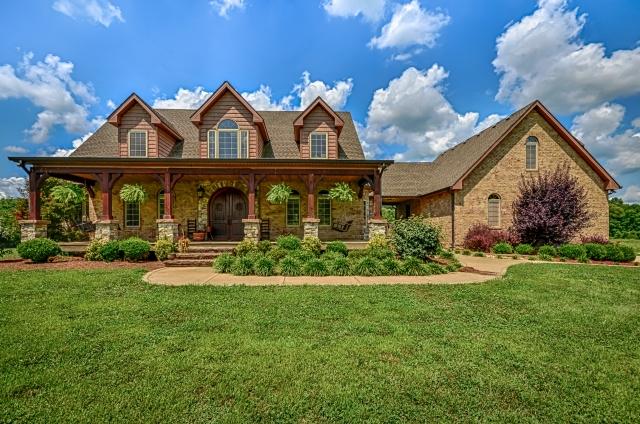 600 Bruce Road Dickson, TN 37055 - Photo 2 of 20 Welcome to 600 Bruce Drive, a truly exquisite luxury home on 22 acres of private tranquility. Built with the utmost attention to detail and using only the finest materials and design elements, it's the dream home you've always envisioned.