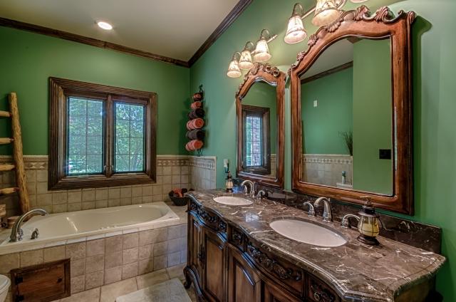 600 Bruce Road Dickson, TN 37055 - Photo 11 of 20 The luxurious master bathroom offers a marble-top double vanity, tile flooring, and separate tile shower with double showerhead. All 3 of the home's other bedrooms also enjoy private bathrooms, making every bedroom in the home a master suite!