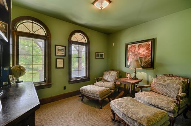 600 Bruce Road Dickson, TN 37055 - Photo 12 of 20 Located on the home's main level, with graceful palladian windows and custom built-in shelving, this space is presently being used as a sitting room, but would also serve as an ideal home office or private study.