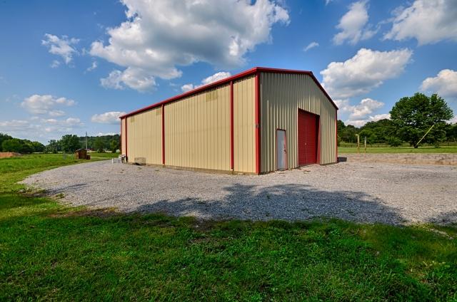 600 Bruce Road Dickson, TN 37055 - Photo 18 of 20 The home also includes this spacious (2,400 square foot) steel barn outbuilding, ideal for a wide variety of uses: animals and tack, yard equipment and tools, a handyman's workshop, storage for an RV and boat, or any number of other possibilities.