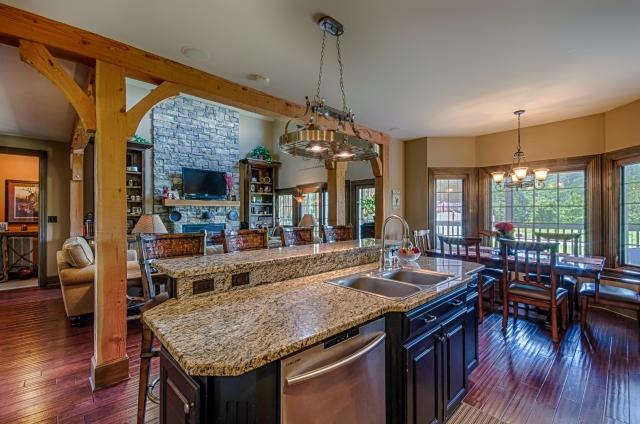 600 Bruce Road Dickson, TN 37055 - Photo 7 of 20 This is every home chef's dream kitchen! It features gleaming granite countertops, custom cabinetry, a huge pantry, center island with double-bowl stainless sink and bar seating, and a spacious eat-in area with fluted trim around the bay windows.