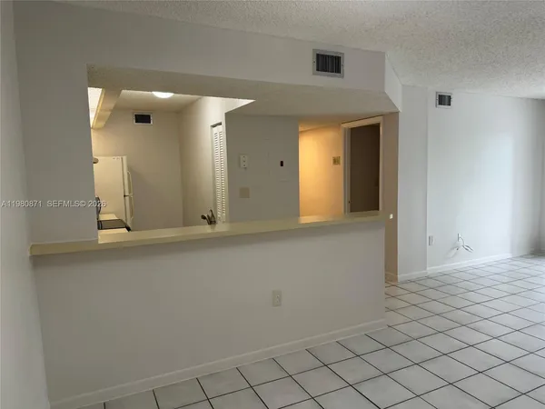 a bathroom with a sink and a large mirror