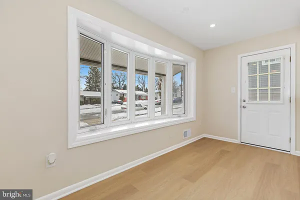 a kitchen with stainless steel appliances a refrigerator and a sink