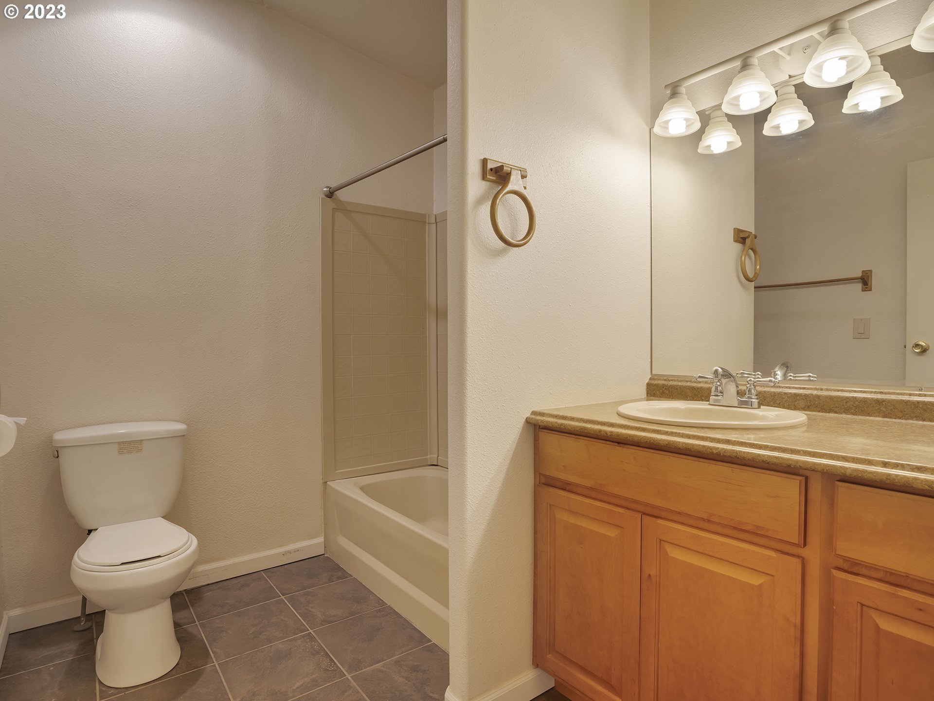 38486 Strawbridge Parkway Sandy, OR 97055 - Photo 18 of 19 a bathroom with a granite countertop sink toilet and shower