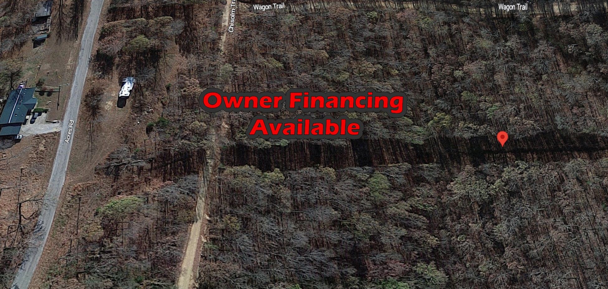 a sign that is sitting on a rock