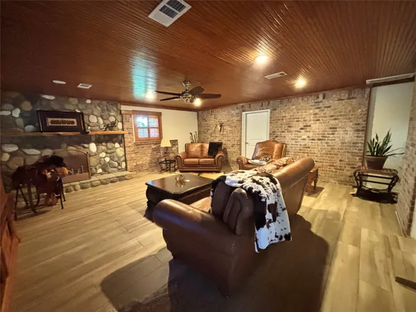 a view of a living room with gym equipment