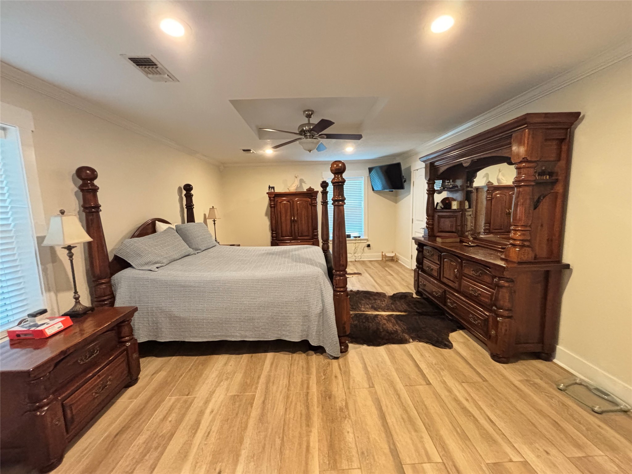 40062 Highway 105 Batson, TX 77519 - Photo 14 of 30 a bed room with a bed and a television