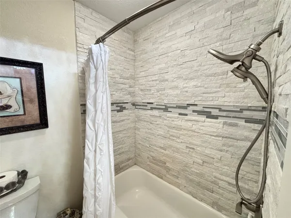 a bathroom with a bathtub