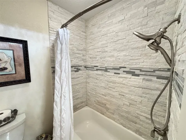 a bathroom with a bathtub