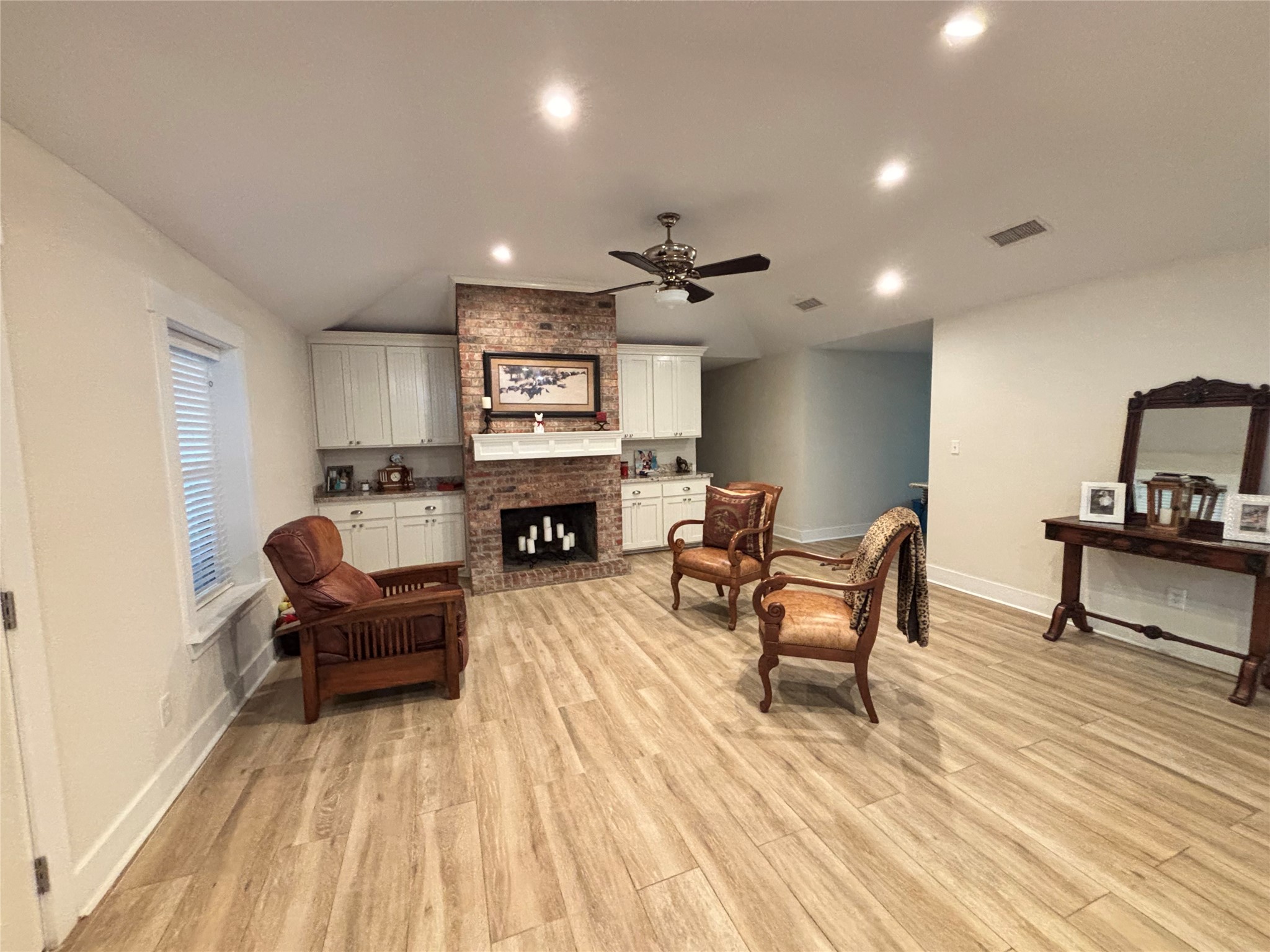 40062 Highway 105 Batson, TX 77519 - Photo 21 of 30 a living room with furniture and a fireplace