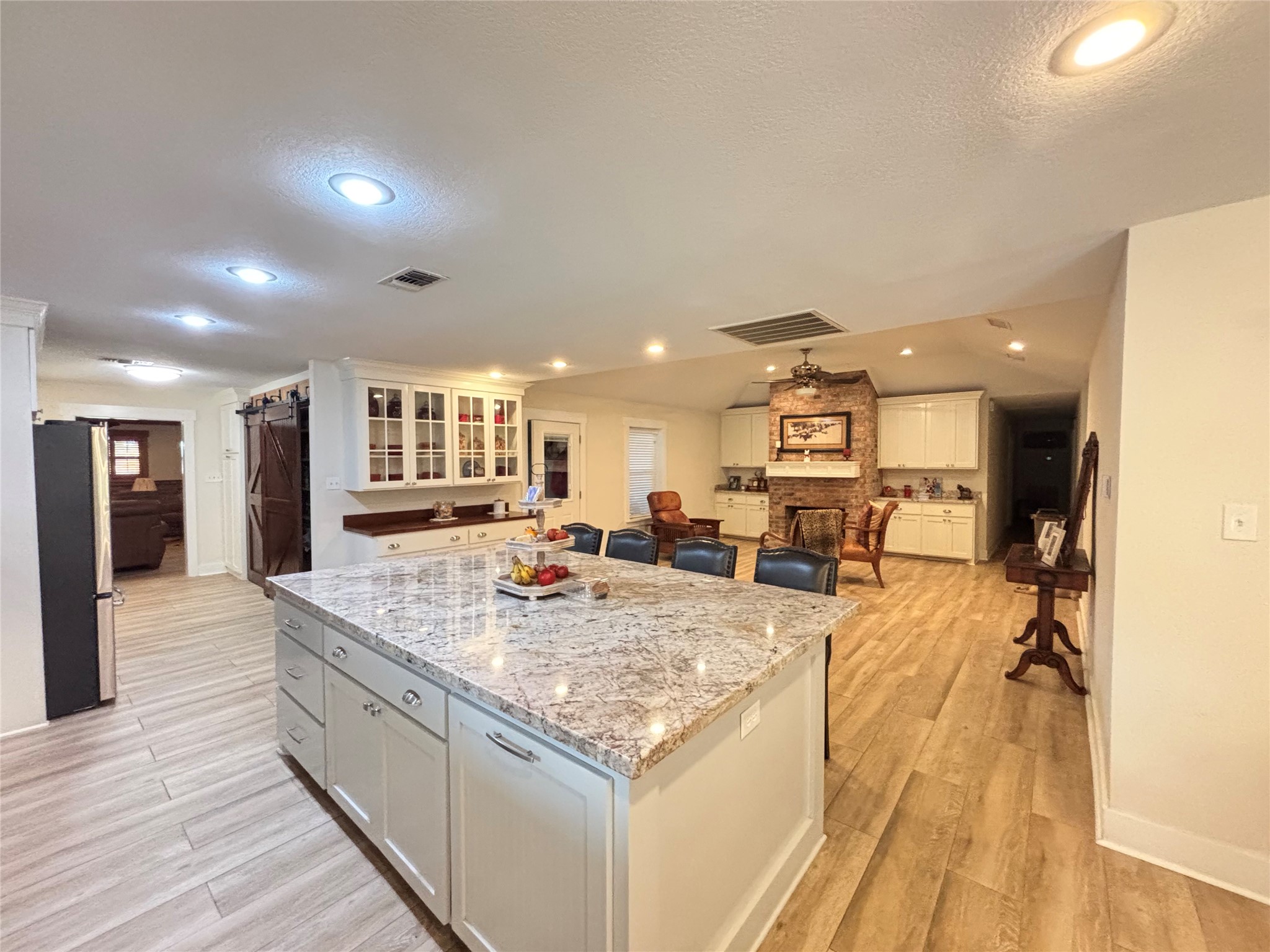 40062 Highway 105 Batson, TX 77519 - Photo 22 of 30 a view of a living room and kitchen counter space