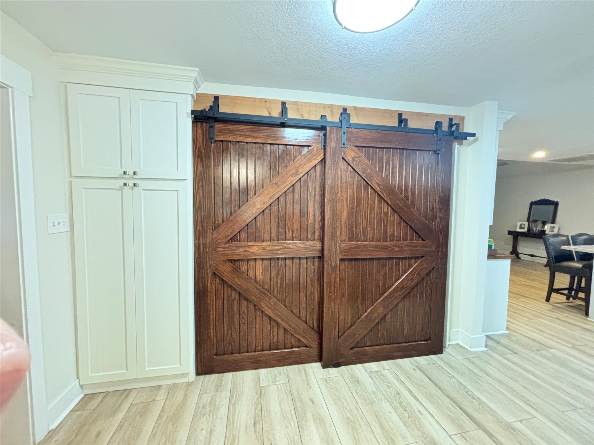 40062 Highway 105 Batson, TX 77519 - Photo 27 of 30 a view of a room with wooden floor and stairs