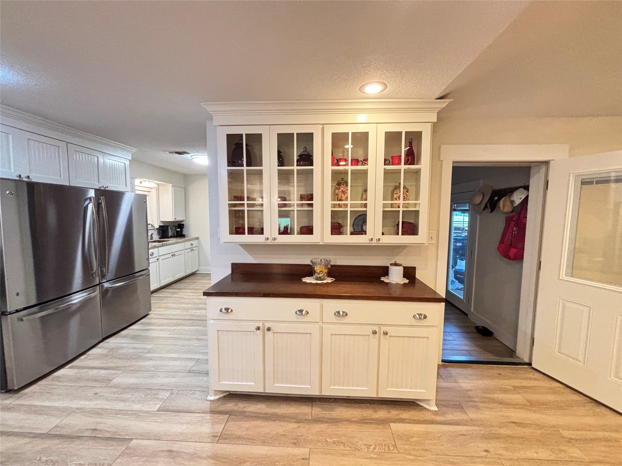 40062 Highway 105 Batson, TX 77519 - Photo 30 of 30 a kitchen with stainless steel appliances granite countertop a refrigerator and a stove top oven