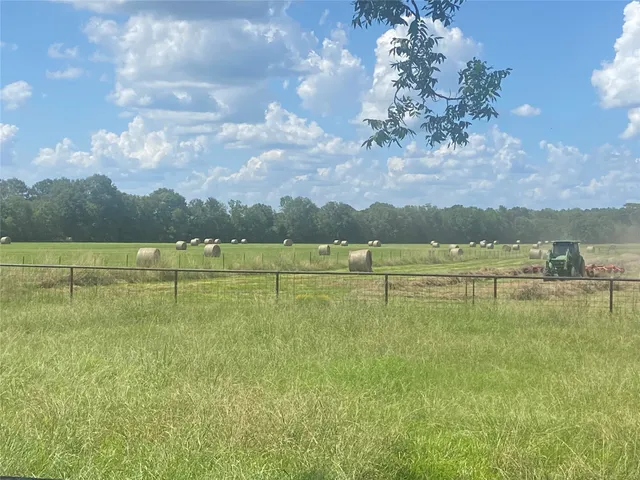 a view of a lake with houses in the background