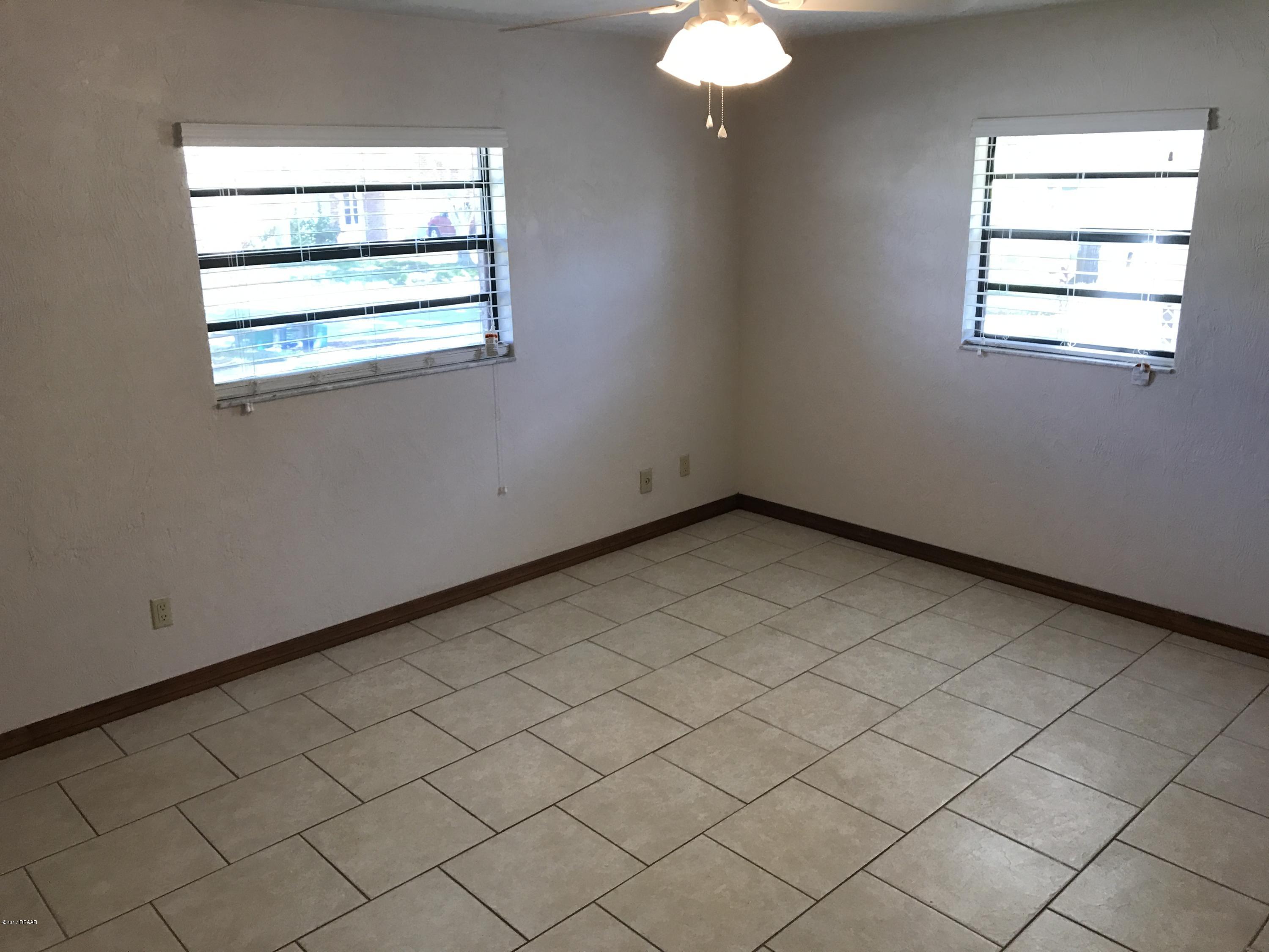65 Raintree Drive Port Orange, FL 32127 - Photo 9 of 19 Master Bedroom