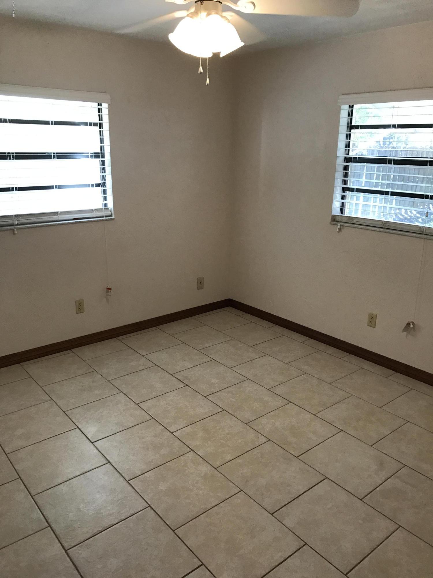 65 Raintree Drive Port Orange, FL 32127 - Photo 11 of 19 Guest Bedroom