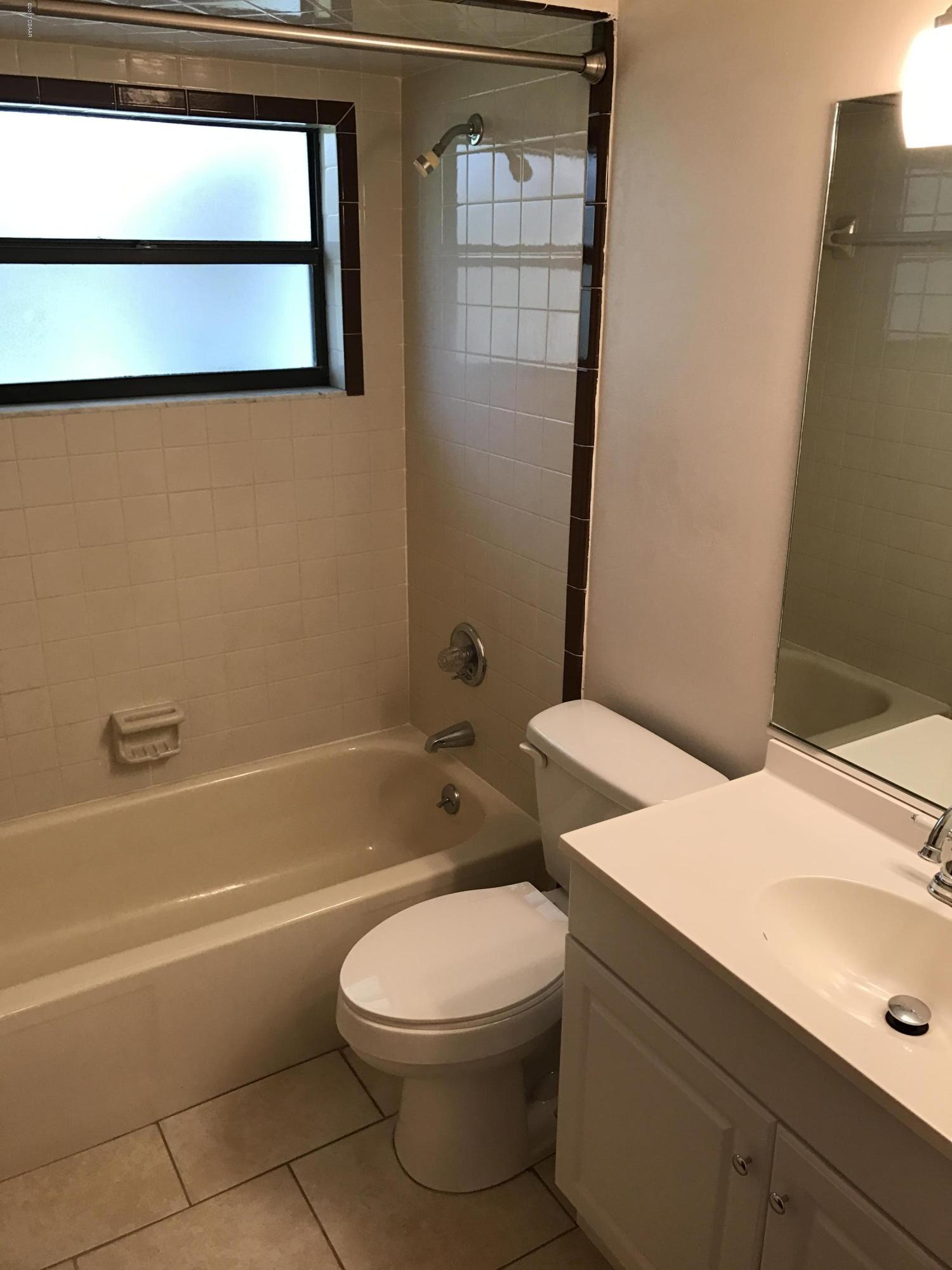 65 Raintree Drive Port Orange, FL 32127 - Photo 12 of 19 Guest Bathroom