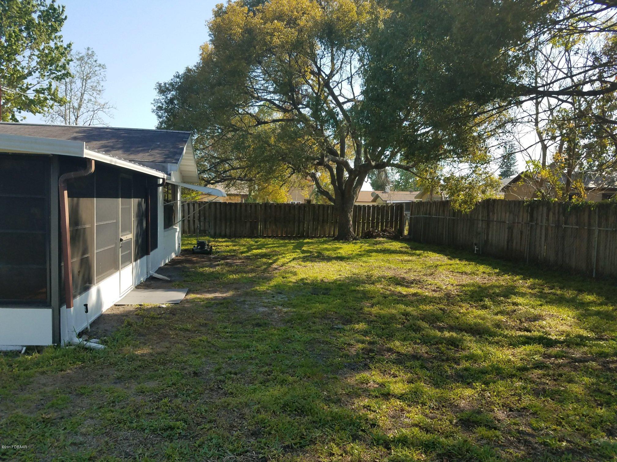 65 Raintree Drive Port Orange, FL 32127 - Photo 15 of 19 Oversized Back Yard