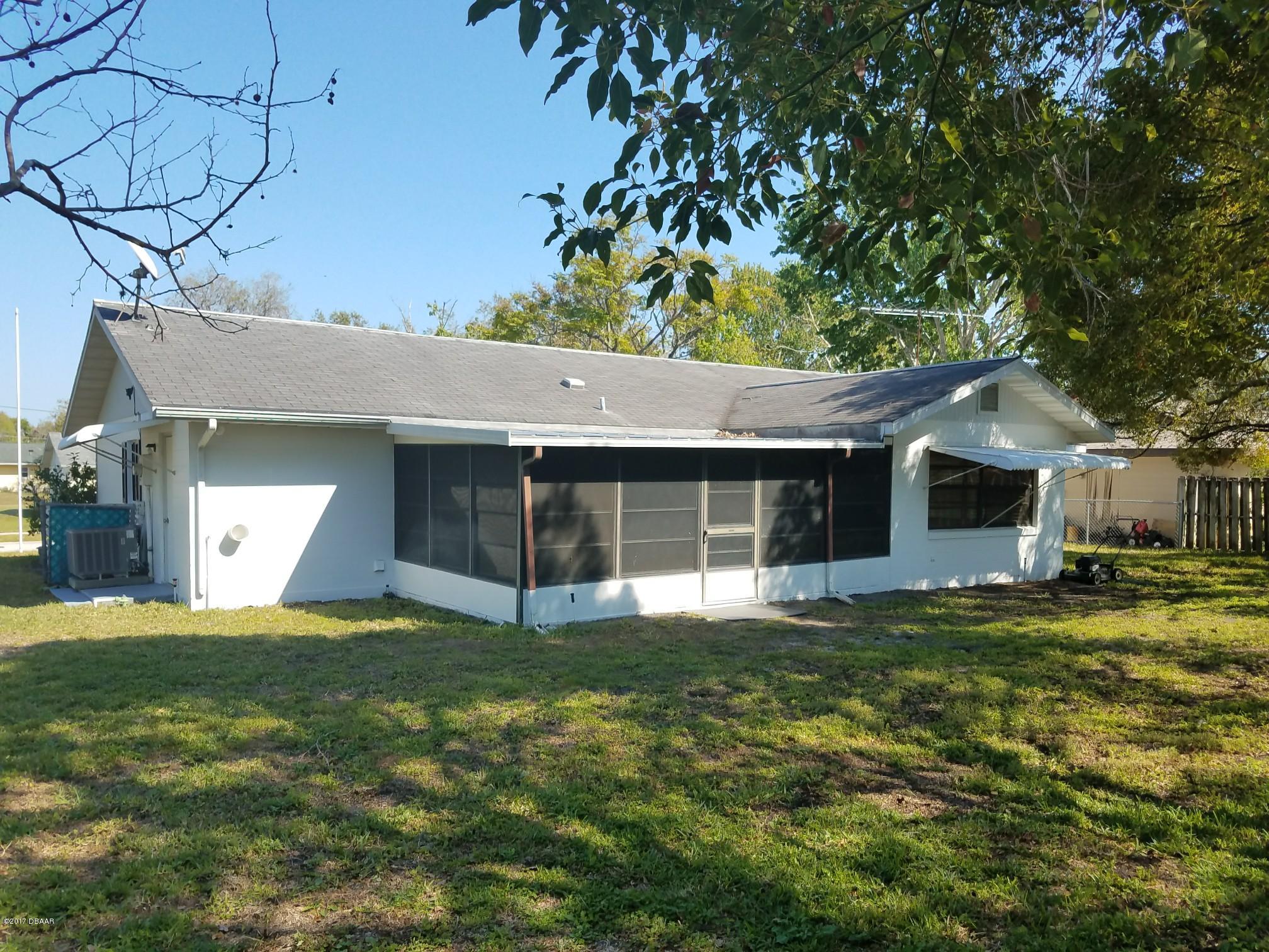65 Raintree Drive Port Orange, FL 32127 - Photo 17 of 19 Enclosed Lanai