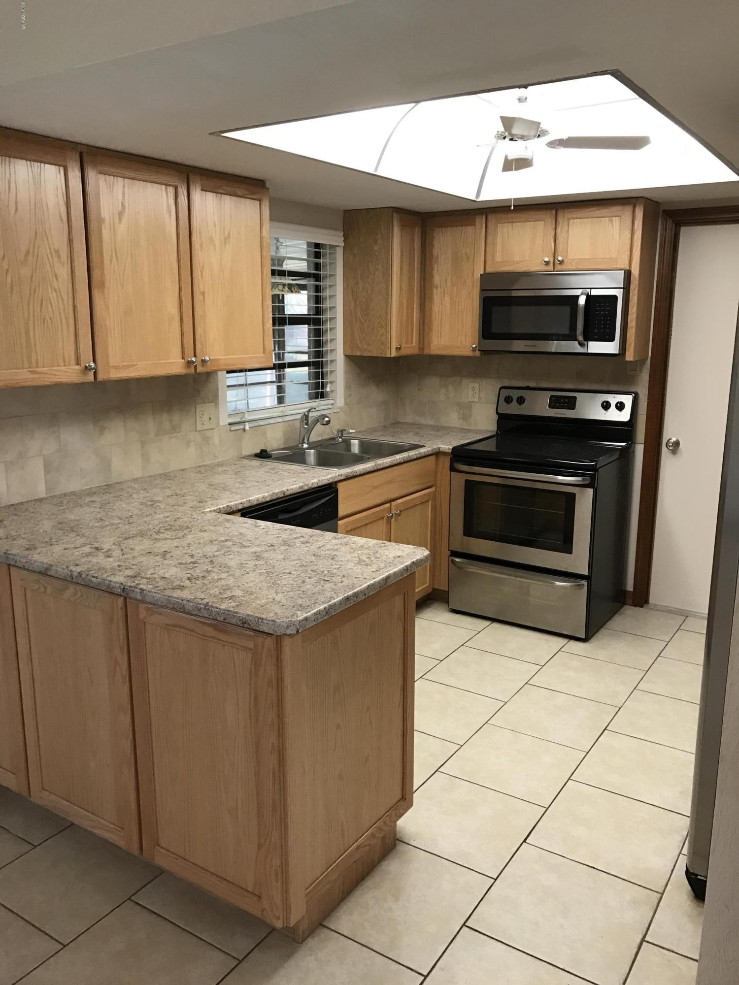 65 Raintree Drive Port Orange, FL 32127 - Photo 4 of 19 Updated Kitchen