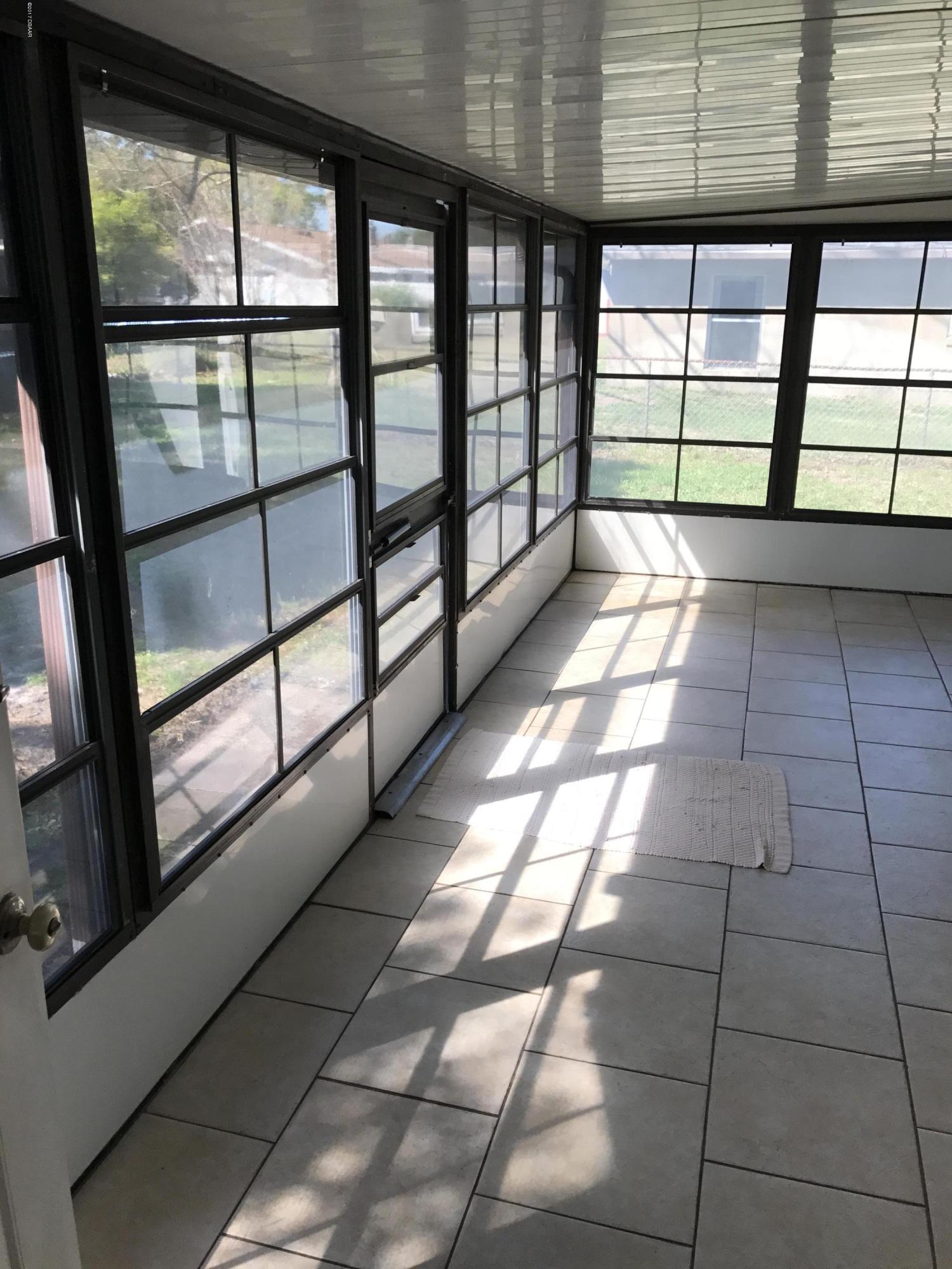 65 Raintree Drive Port Orange, FL 32127 - Photo 8 of 19 Tile Floors