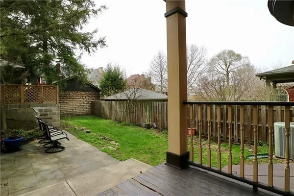 a bathroom with a toilet a sink and a mirror